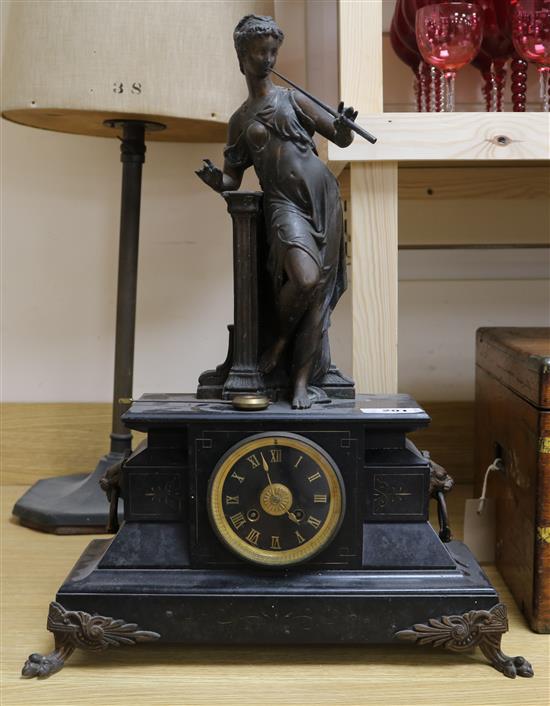 A Victorian black marble and bronzed spelter mantel clock, 21in.